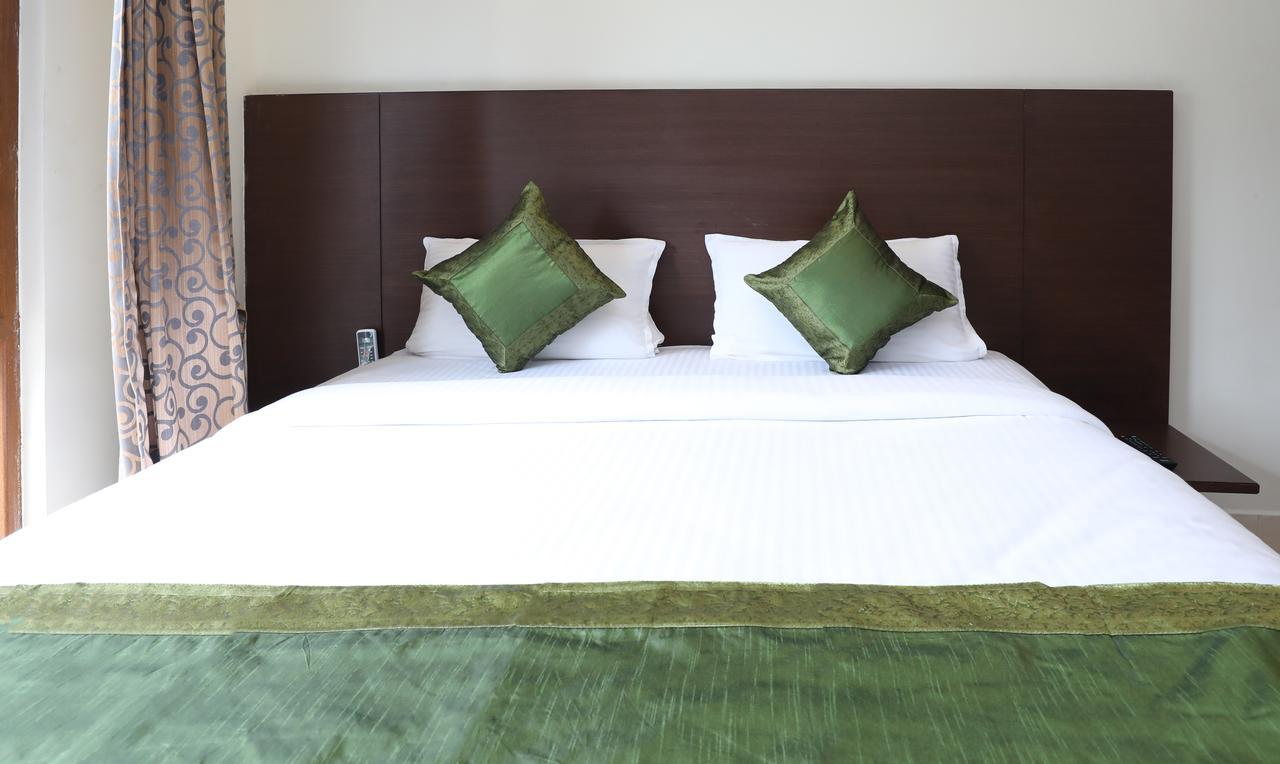 Treebo Trend Pratham Residency Hotell Udupi Exteriör bild